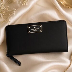 kate spade Neda Wilson Road Large Black Zip-Around Wallet with Gold Plaque
